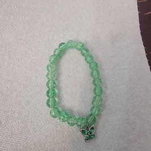 Green beaded bracelet.